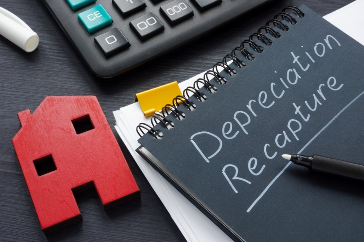Model of a house and a note of depreciation recapture